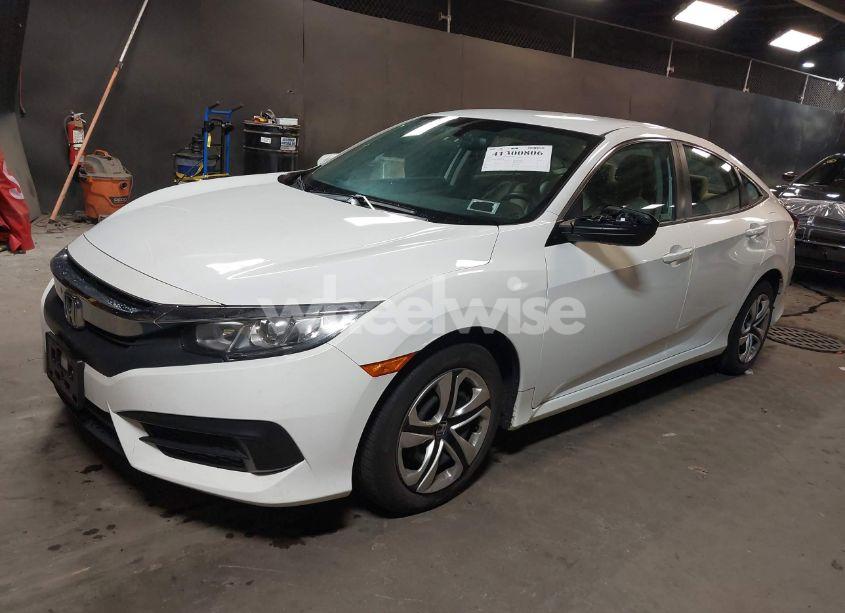 Photo 2 of 2018 Honda Civic LX (VIN 2HGFC2F55JH566492)
