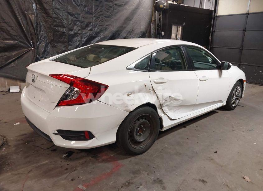 Photo 4 of 2018 Honda Civic LX (VIN 2HGFC2F55JH566492)