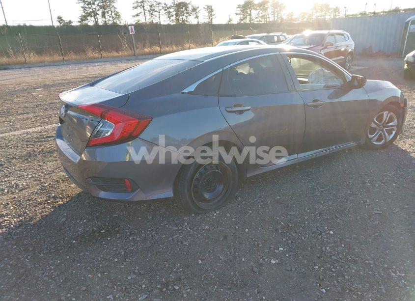 Photo 4 of 2018 Honda Civic LX (VIN 2HGFC2F55JH571272)