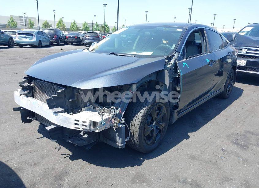 Photo 2 of 2018 Honda Civic LX (VIN 2HGFC2F55JH578917)