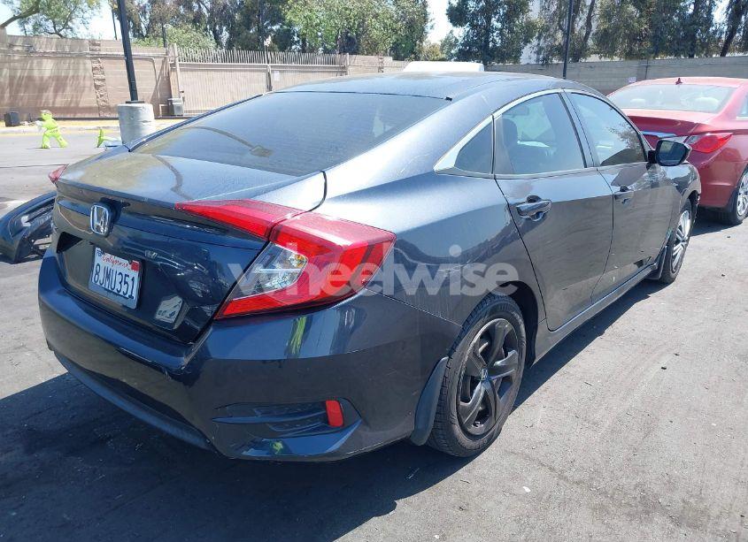 Photo 4 of 2018 Honda Civic LX (VIN 2HGFC2F55JH578917)
