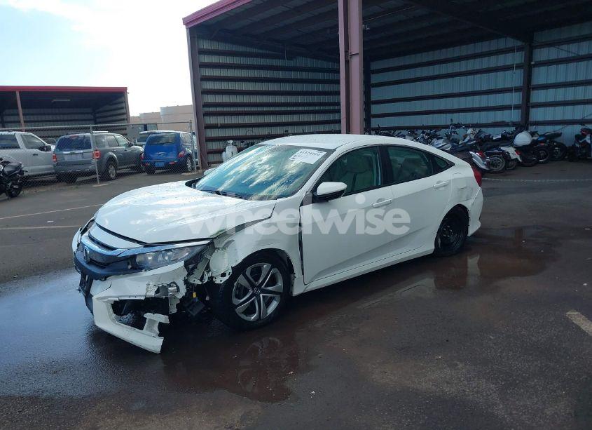 Photo 2 of 2018 Honda Civic LX (VIN 2HGFC2F55JH587147)