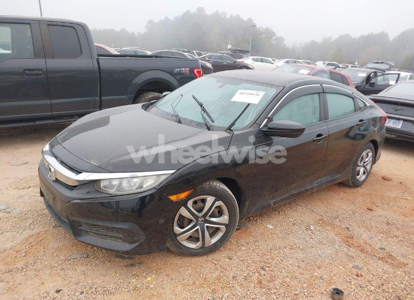 Photo 2 of 2018 Honda Civic LX (VIN 2HGFC2F55JH595412)