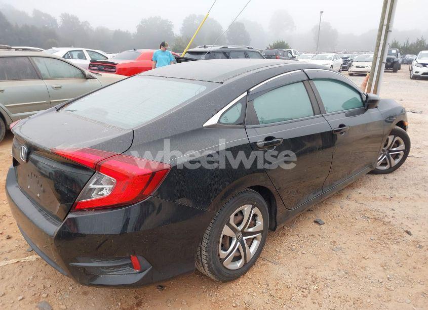 Photo 4 of 2018 Honda Civic LX (VIN 2HGFC2F55JH595412)