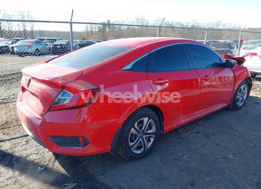 Photo 4 of 2018 Honda Civic LX (VIN 2HGFC2F55JH601080)