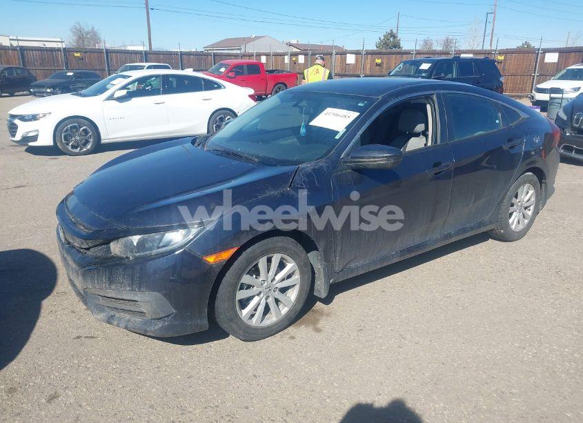 Photo 2 of 2018 Honda Civic LX (VIN 2HGFC2F55JH607350)