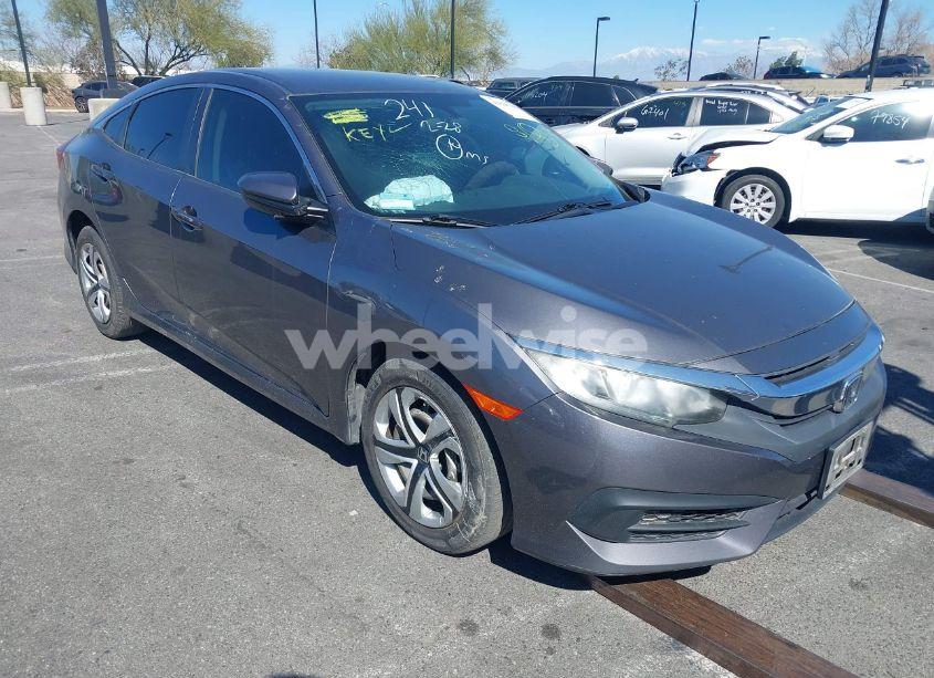2018 Honda Civic LX (VIN 2HGFC2F55JH609423) main photo