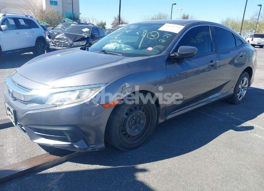 Photo 2 of 2018 Honda Civic LX (VIN 2HGFC2F55JH609423)