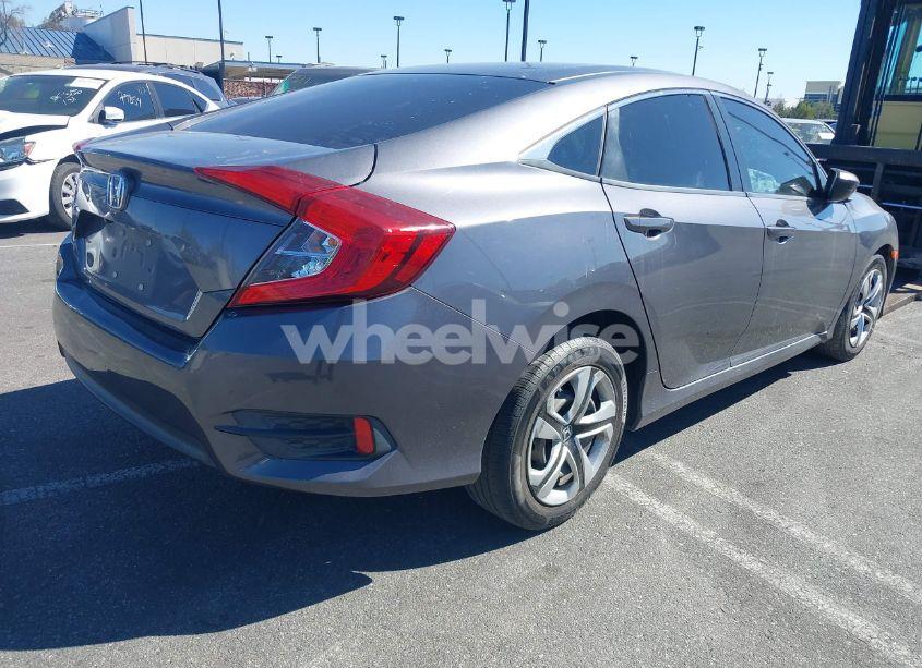Photo 4 of 2018 Honda Civic LX (VIN 2HGFC2F55JH609423)