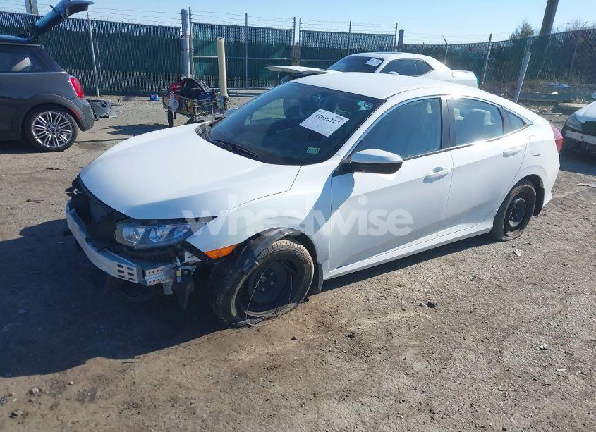 Photo 2 of 2017 Honda Civic LX (VIN 2HGFC2F56HH510779)