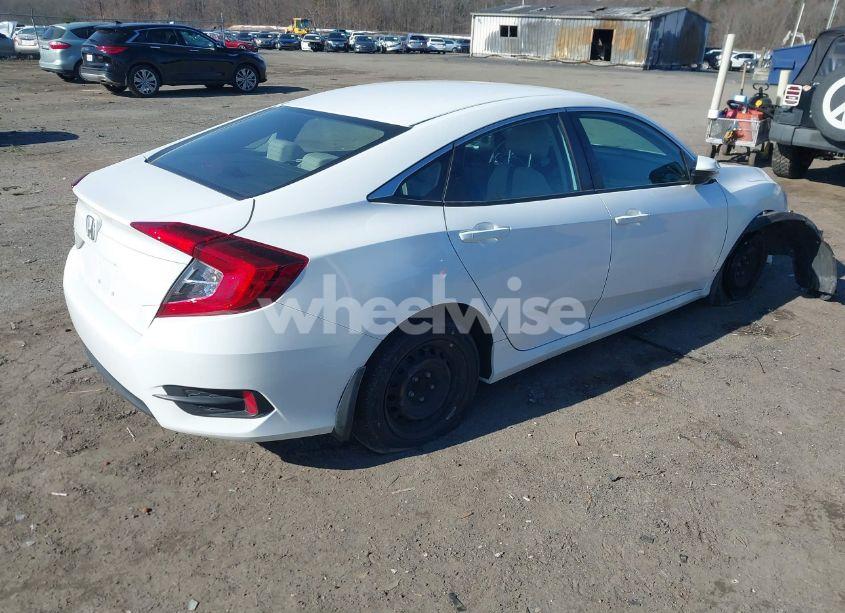 Photo 4 of 2017 Honda Civic LX (VIN 2HGFC2F56HH510779)