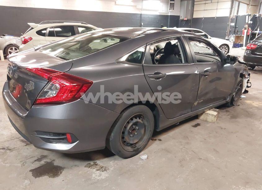 Photo 4 of 2017 Honda Civic LX (VIN 2HGFC2F56HH564311)