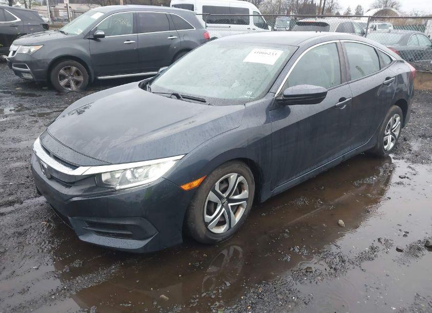 Photo 2 of 2017 Honda Civic LX (VIN 2HGFC2F56HH572845)