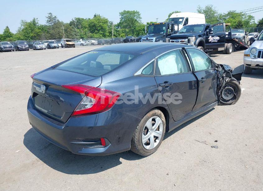 Photo 4 of 2018 Honda Civic LX (VIN 2HGFC2F56JH505278)