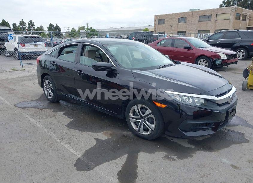 2018 Honda Civic LX (VIN 2HGFC2F56JH509525) main photo