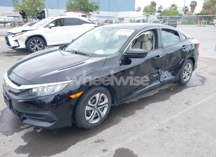 Photo 2 of 2018 Honda Civic LX (VIN 2HGFC2F56JH509525)