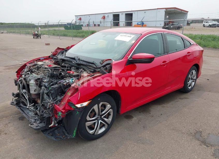 Photo 2 of 2018 Honda Civic LX (VIN 2HGFC2F56JH516345)