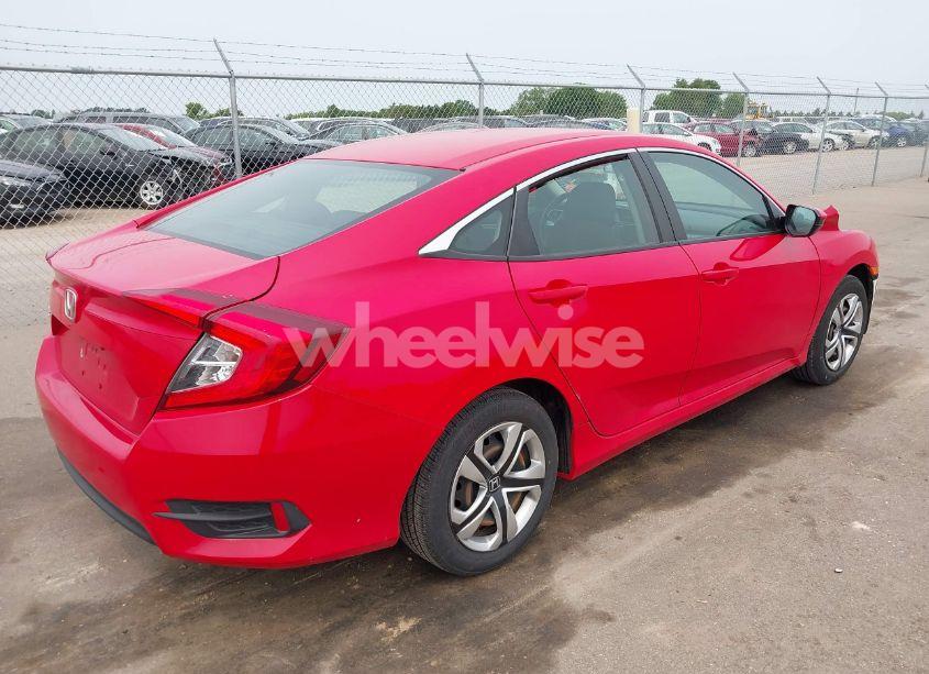 Photo 4 of 2018 Honda Civic LX (VIN 2HGFC2F56JH516345)