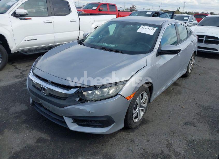 Photo 2 of 2018 Honda Civic LX (VIN 2HGFC2F56JH527216)