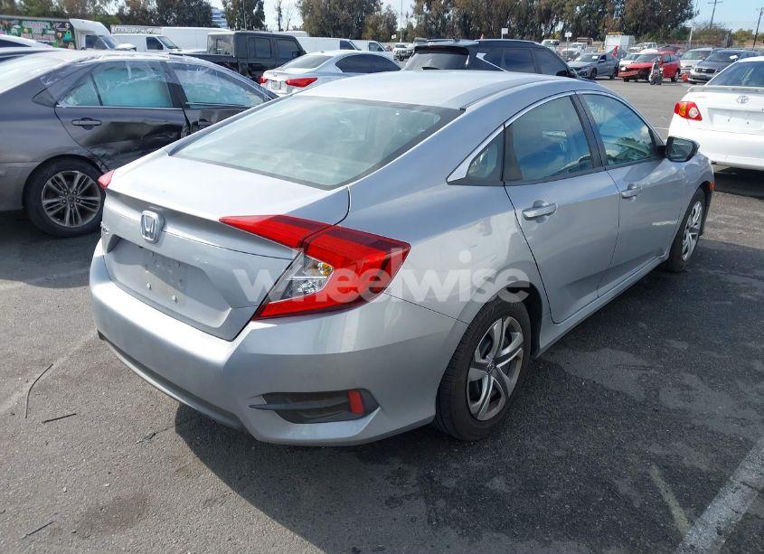 Photo 4 of 2018 Honda Civic LX (VIN 2HGFC2F56JH527216)