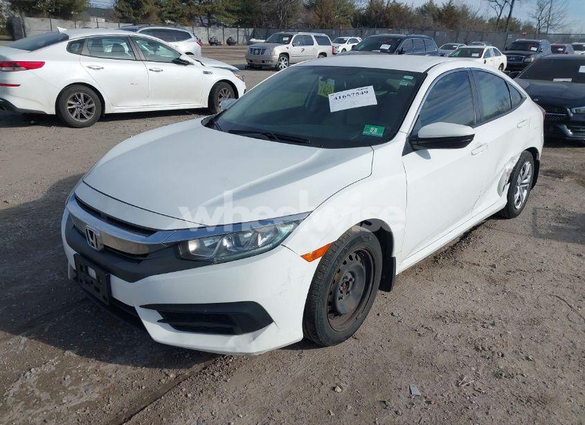 Photo 2 of 2018 Honda Civic LX (VIN 2HGFC2F56JH586735)