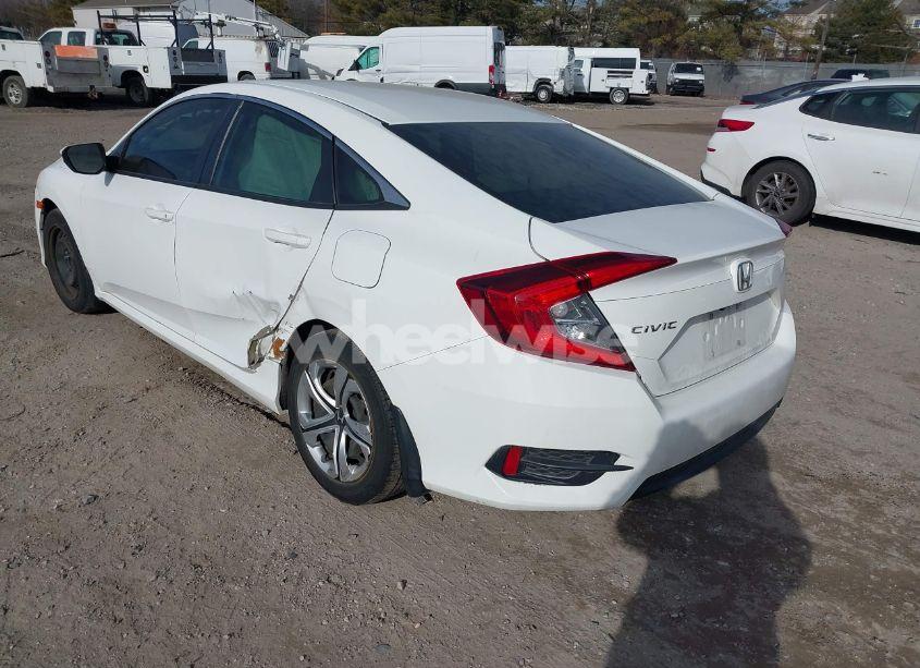 Photo 3 of 2018 Honda Civic LX (VIN 2HGFC2F56JH586735)