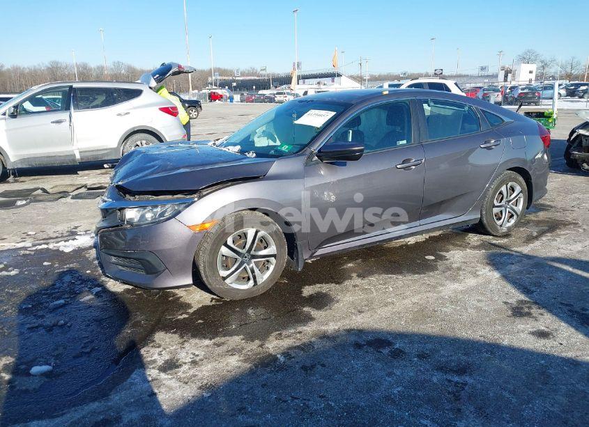 Photo 2 of 2018 Honda Civic LX (VIN 2HGFC2F56JH587657)