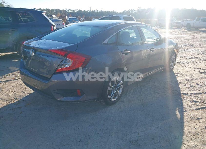 Photo 4 of 2018 Honda Civic LX (VIN 2HGFC2F56JH596701)