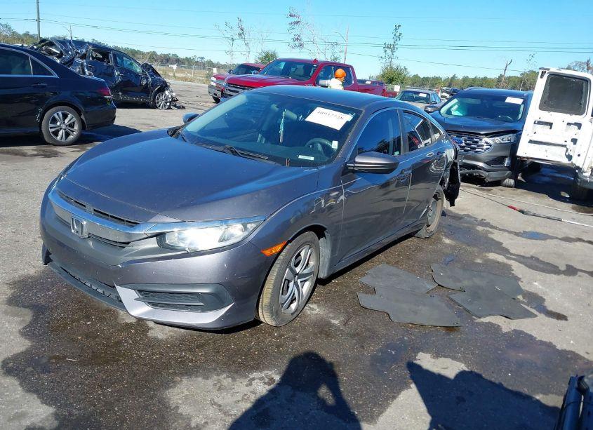 Photo 2 of 2018 Honda Civic LX (VIN 2HGFC2F56JH602884)