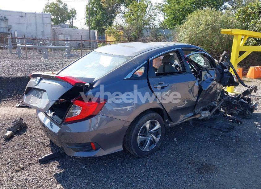 Photo 4 of 2018 Honda Civic LX (VIN 2HGFC2F56JH610712)