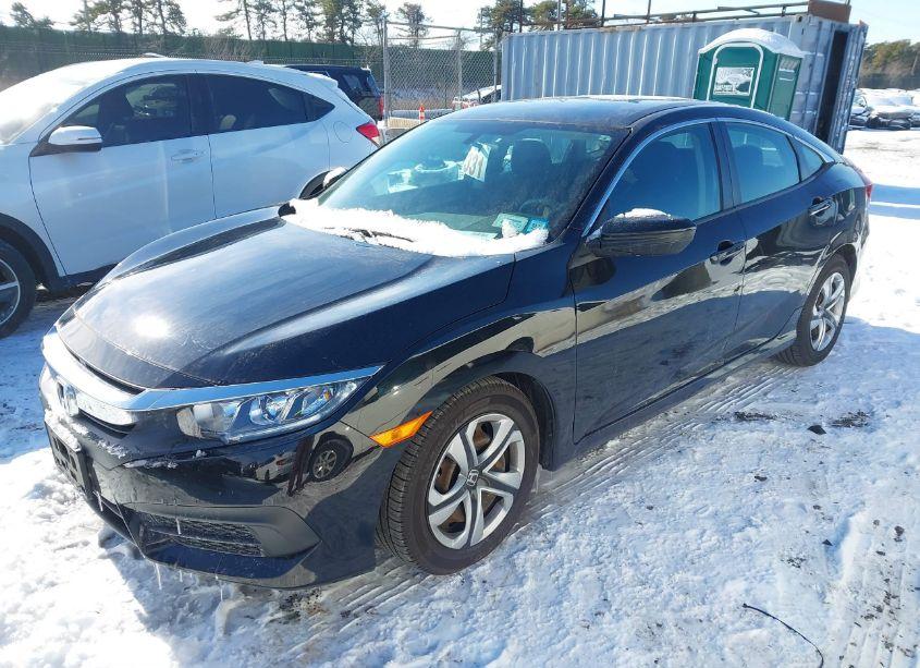Photo 2 of 2016 Honda Civic LX (VIN 2HGFC2F57GH558810)