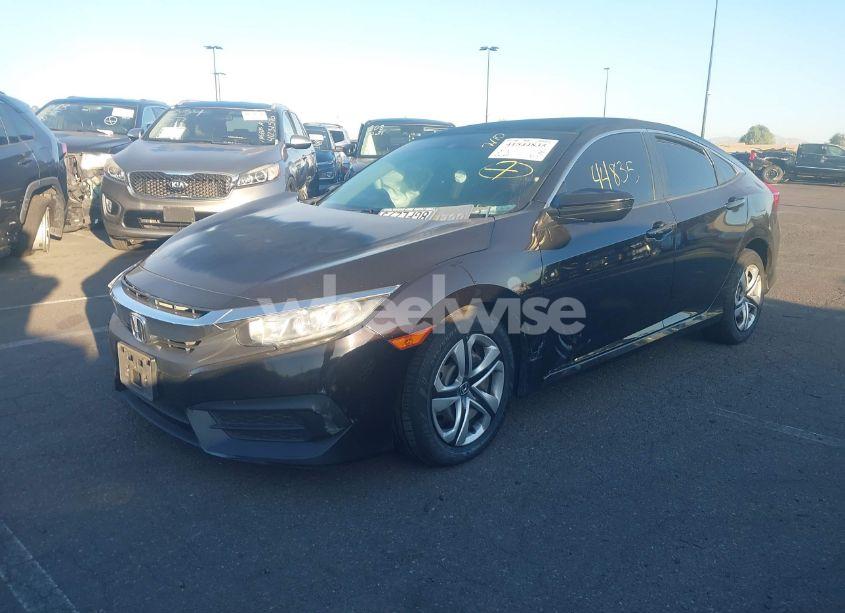 Photo 2 of 2016 Honda Civic LX (VIN 2HGFC2F57GH565465)