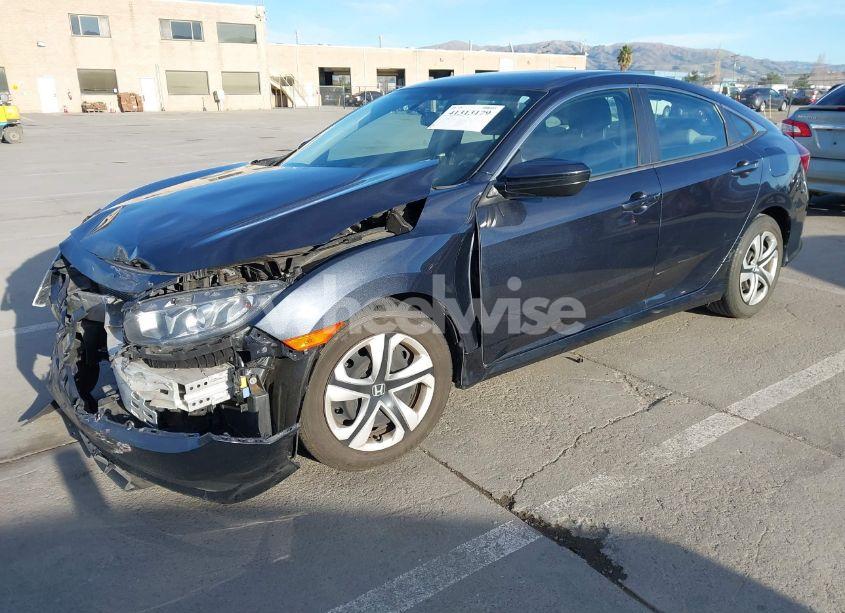 Photo 2 of 2017 Honda Civic LX (VIN 2HGFC2F57HH572711)