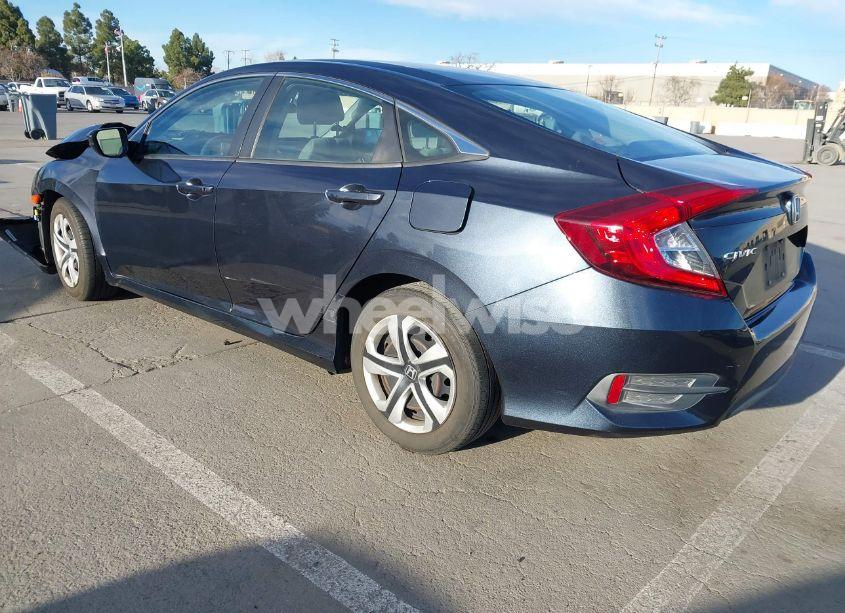 Photo 3 of 2017 Honda Civic LX (VIN 2HGFC2F57HH572711)