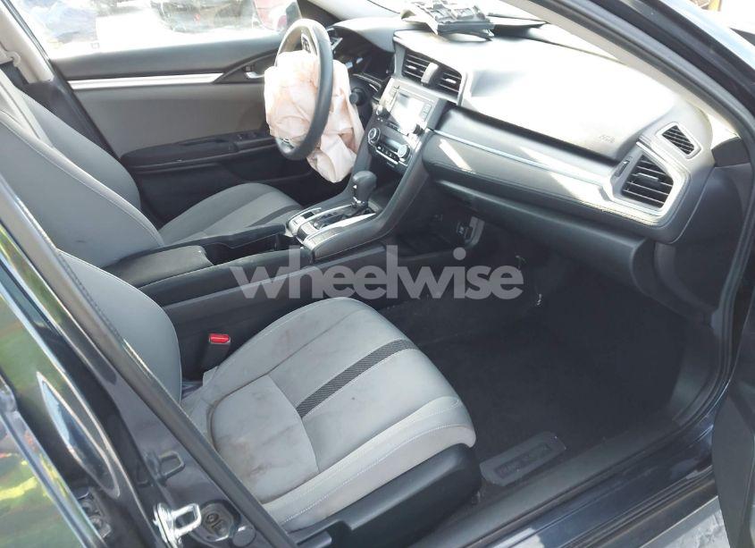 Photo 5 of 2017 Honda Civic LX (VIN 2HGFC2F57HH572711)