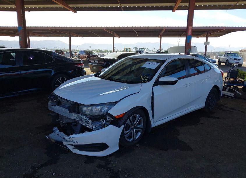 Photo 2 of 2018 Honda Civic LX (VIN 2HGFC2F57JH502387)