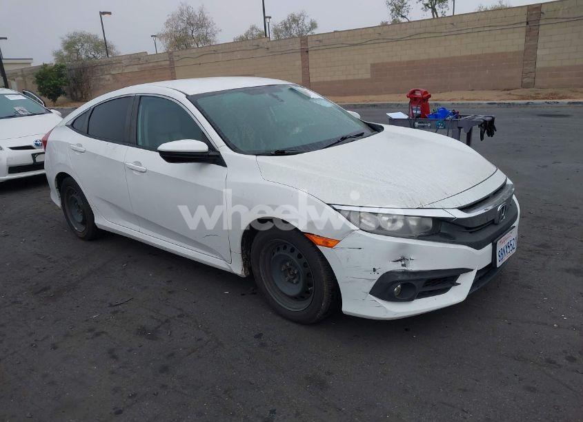 2018 Honda Civic LX (VIN 2HGFC2F57JH502776) main photo