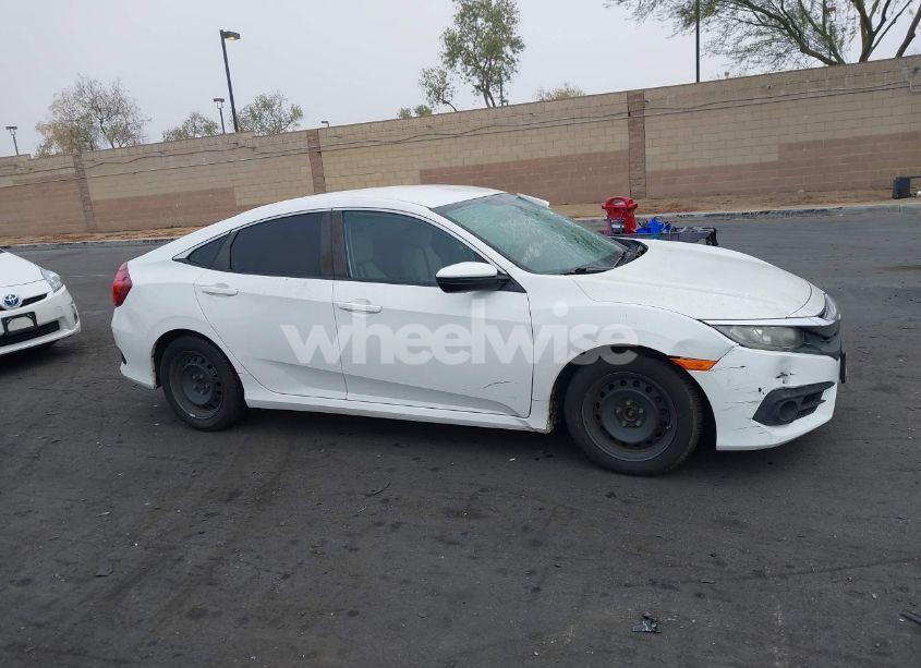 Photo 14 of 2018 Honda Civic LX (VIN 2HGFC2F57JH502776)