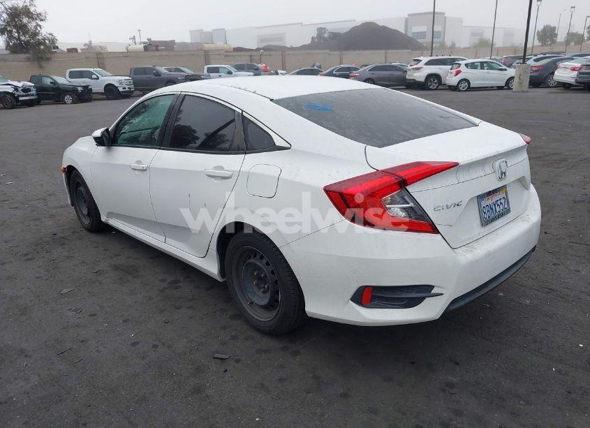 Photo 3 of 2018 Honda Civic LX (VIN 2HGFC2F57JH502776)