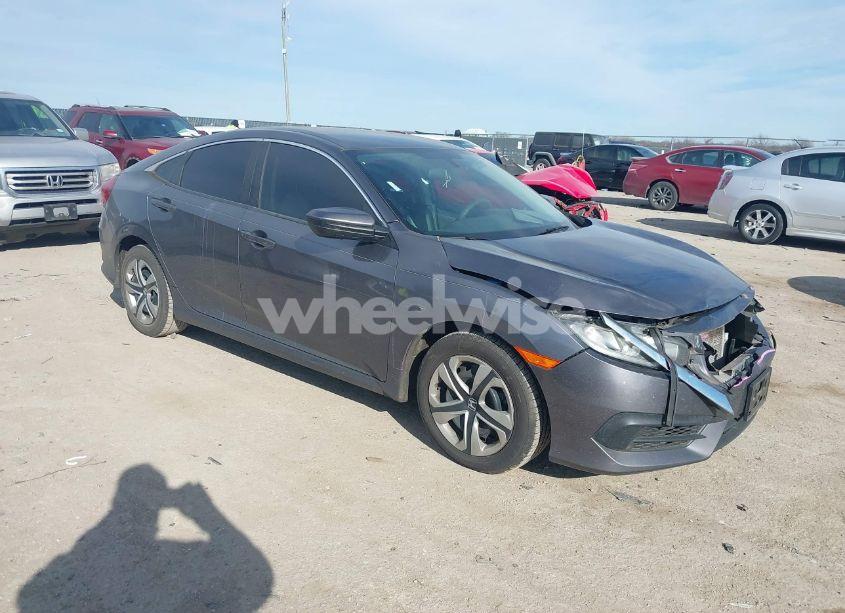 2018 Honda Civic LX (VIN 2HGFC2F57JH517889) main photo
