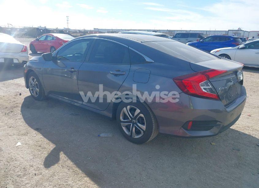 Photo 3 of 2018 Honda Civic LX (VIN 2HGFC2F57JH517889)