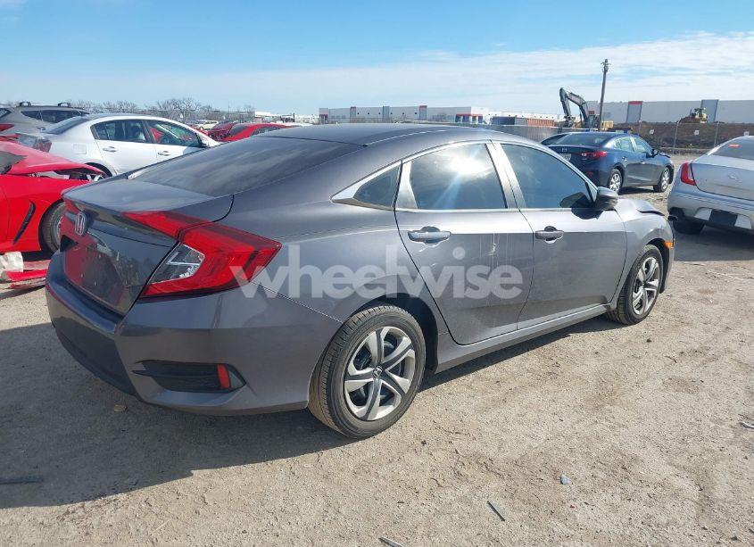 Photo 4 of 2018 Honda Civic LX (VIN 2HGFC2F57JH517889)