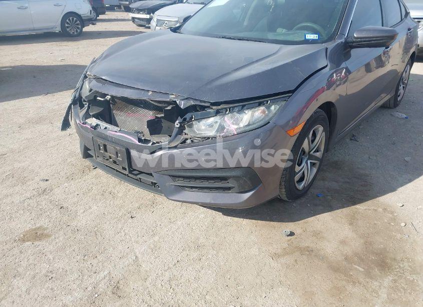 Photo 6 of 2018 Honda Civic LX (VIN 2HGFC2F57JH517889)