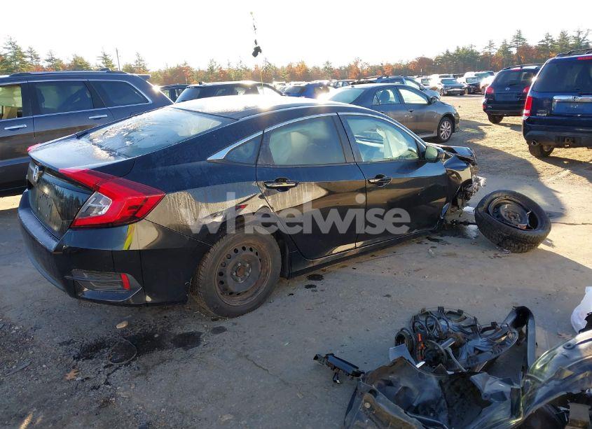 Photo 4 of 2018 Honda Civic LX (VIN 2HGFC2F57JH558216)