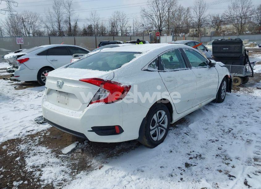 Photo 4 of 2018 Honda Civic LX (VIN 2HGFC2F57JH568597)