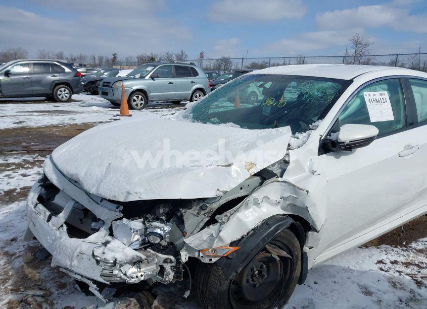 Photo 6 of 2018 Honda Civic LX (VIN 2HGFC2F57JH568597)