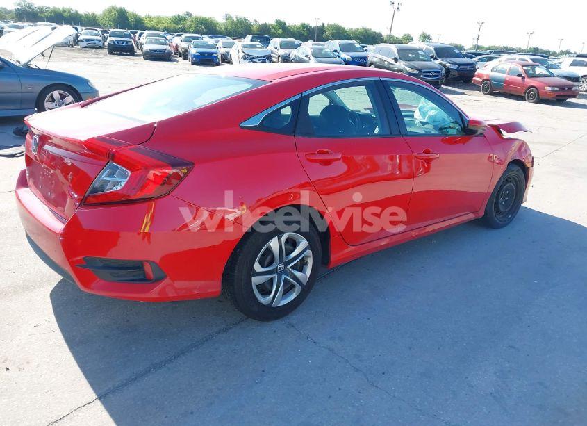 Photo 4 of 2018 Honda Civic LX (VIN 2HGFC2F57JH568972)