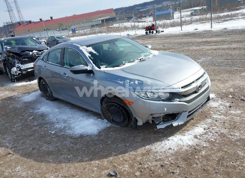 2018 Honda Civic LX (VIN 2HGFC2F57JH571628) main photo