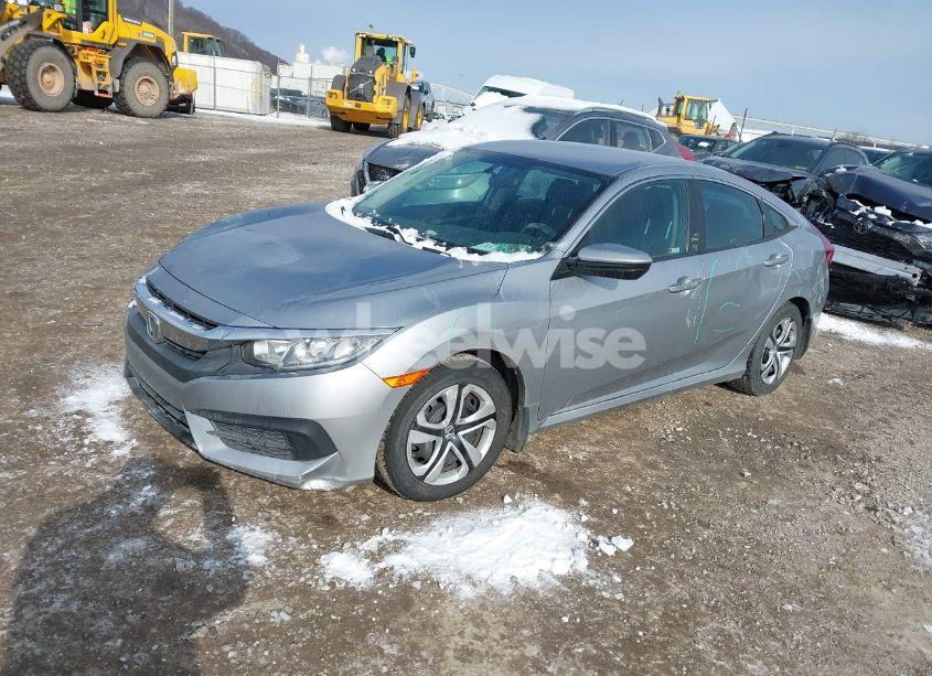 Photo 2 of 2018 Honda Civic LX (VIN 2HGFC2F57JH571628)