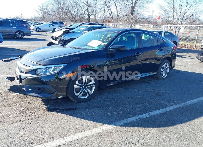Photo 2 of 2018 Honda Civic LX (VIN 2HGFC2F57JH581110)